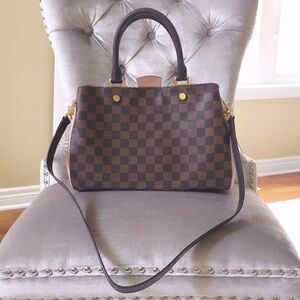 LV handbag with shoulder strap
